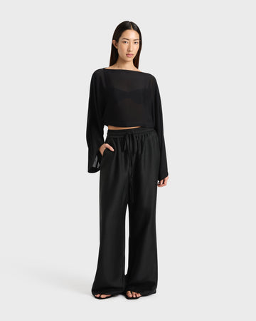BONDI BORN Bormio Luxe Pant in Black styled with Cremona Kimono Top, tailored wide-leg silhouette in breathable Japanese fabric for modern resort dressing.